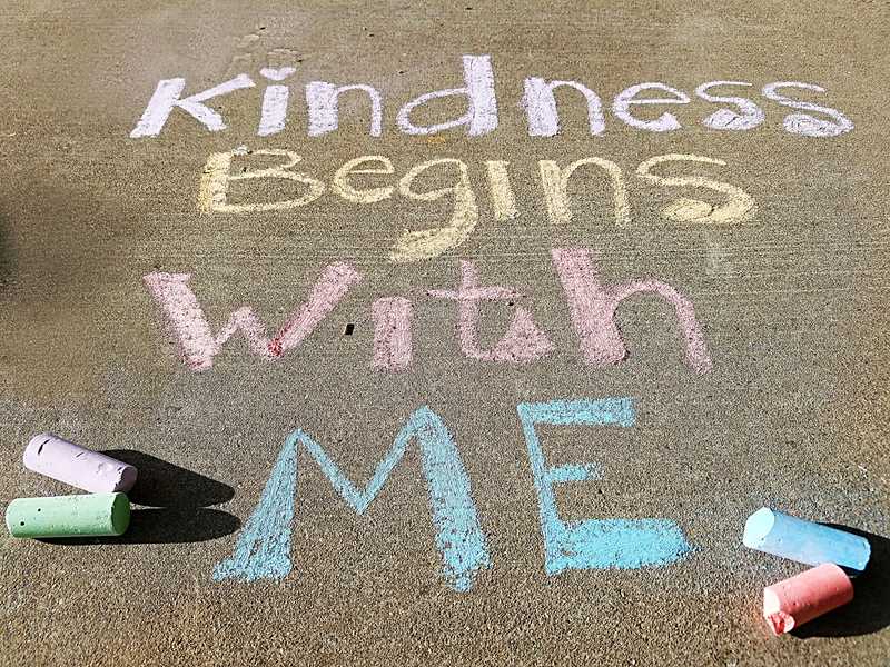 Kindness begins with me written in chalk