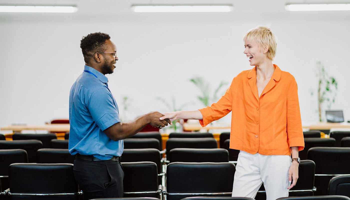 Man and woman greeting