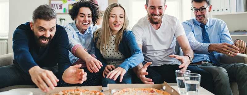 Culture at work - women and man eating pizza