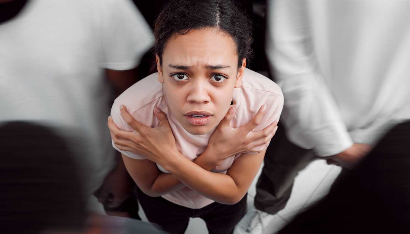 Woman struggling embracing arms