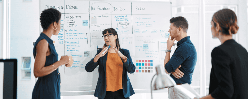 A business team discussing CVP message